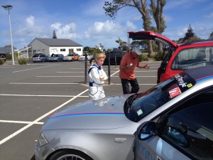 Robbie and Rhonda servicing car at Hawera